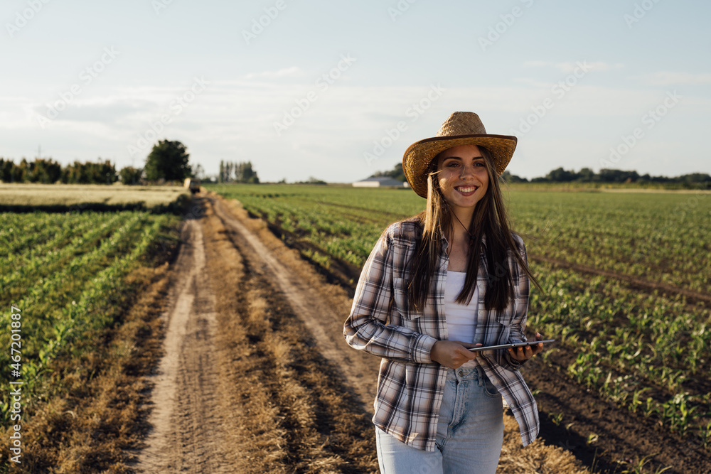 woman farmer walking on field